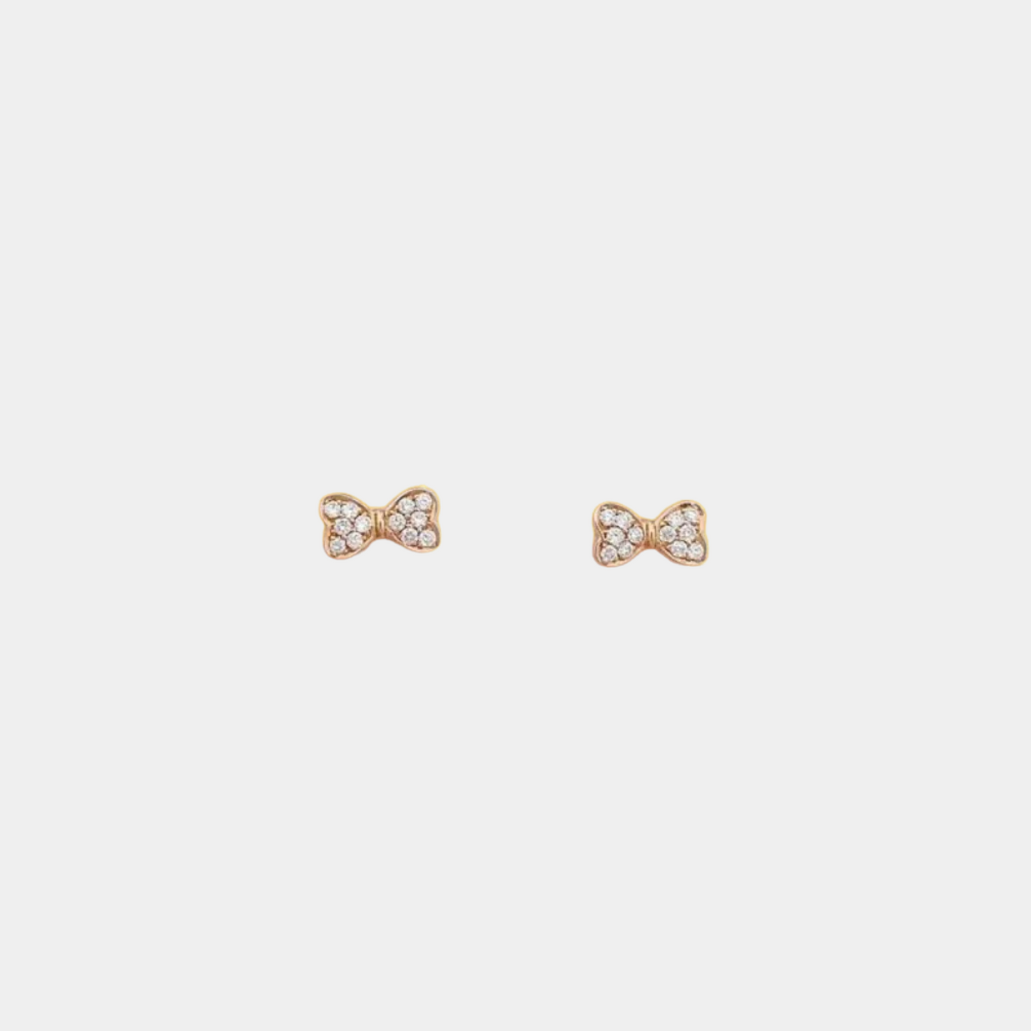 18k rose gold bow stud earrings with natural diamonds (ngtc certified)
