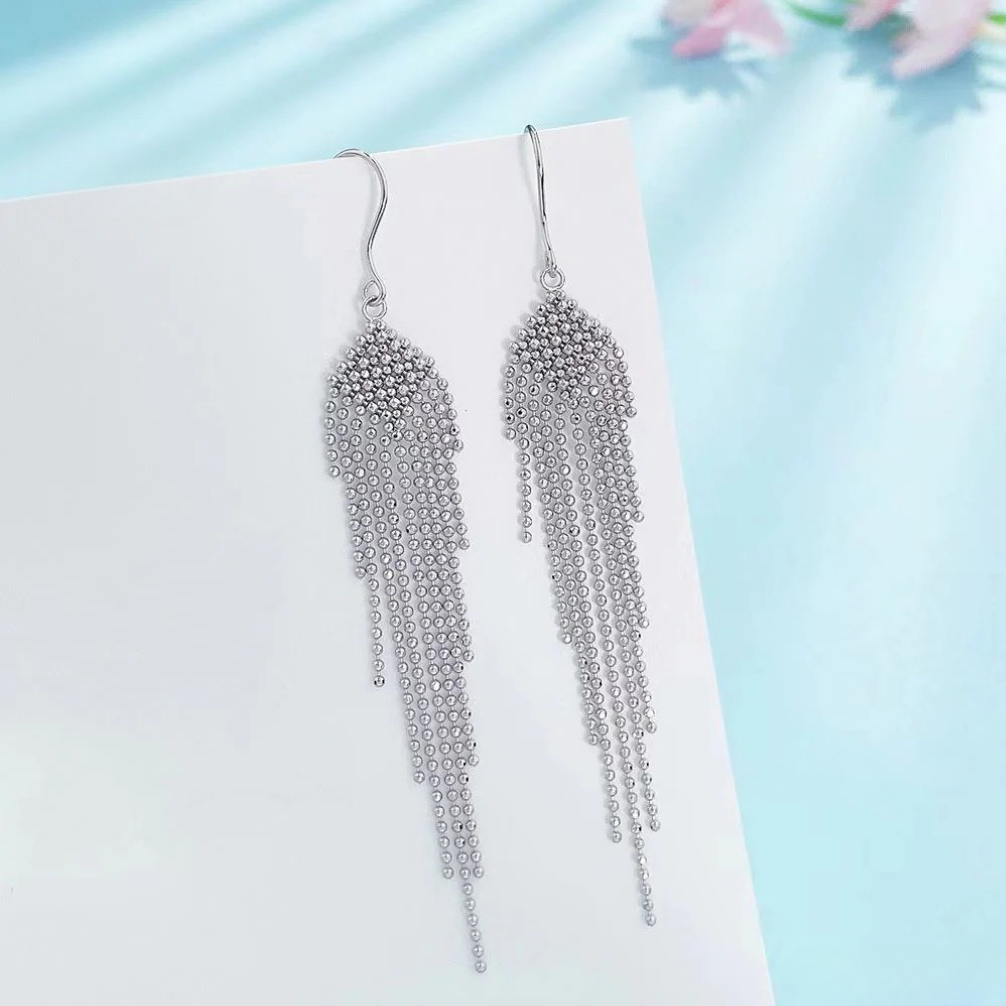 platinum geometric tassel drop earrings with beaded lace weave