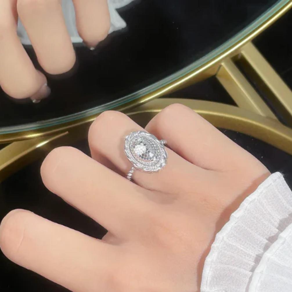 platinum hollow bead fish scale pigeon egg ring — elegant feminine statement